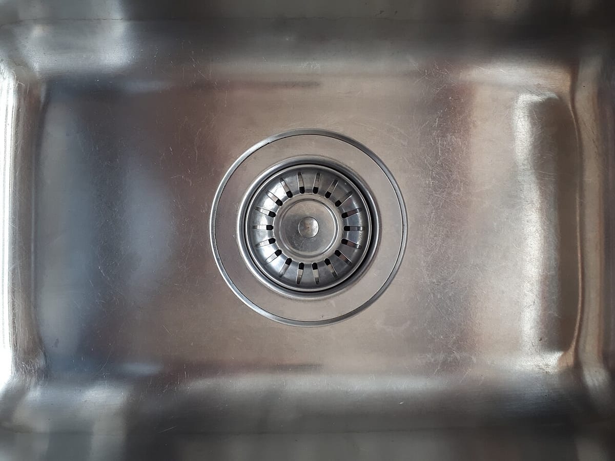 How to Unclog a Kitchen Sink Drain Without Calling a Plumber