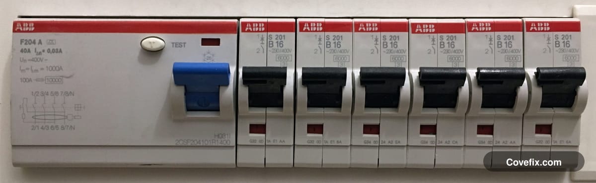 A row of breaker switches inside an electrical panel