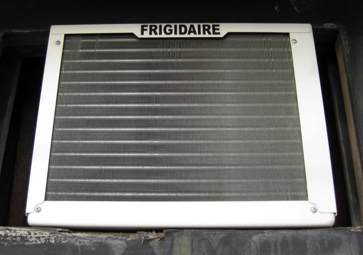 Close-up of the aluminium fins on an air conditioner condenser coil