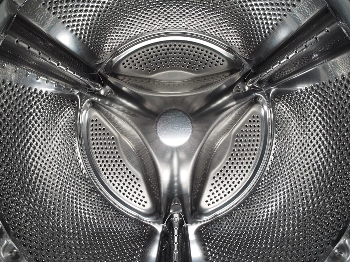 The stainless steel drum of a front-loading washing machine